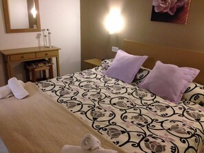 Desk, blackout curtains, free cots/infant beds, WiFi