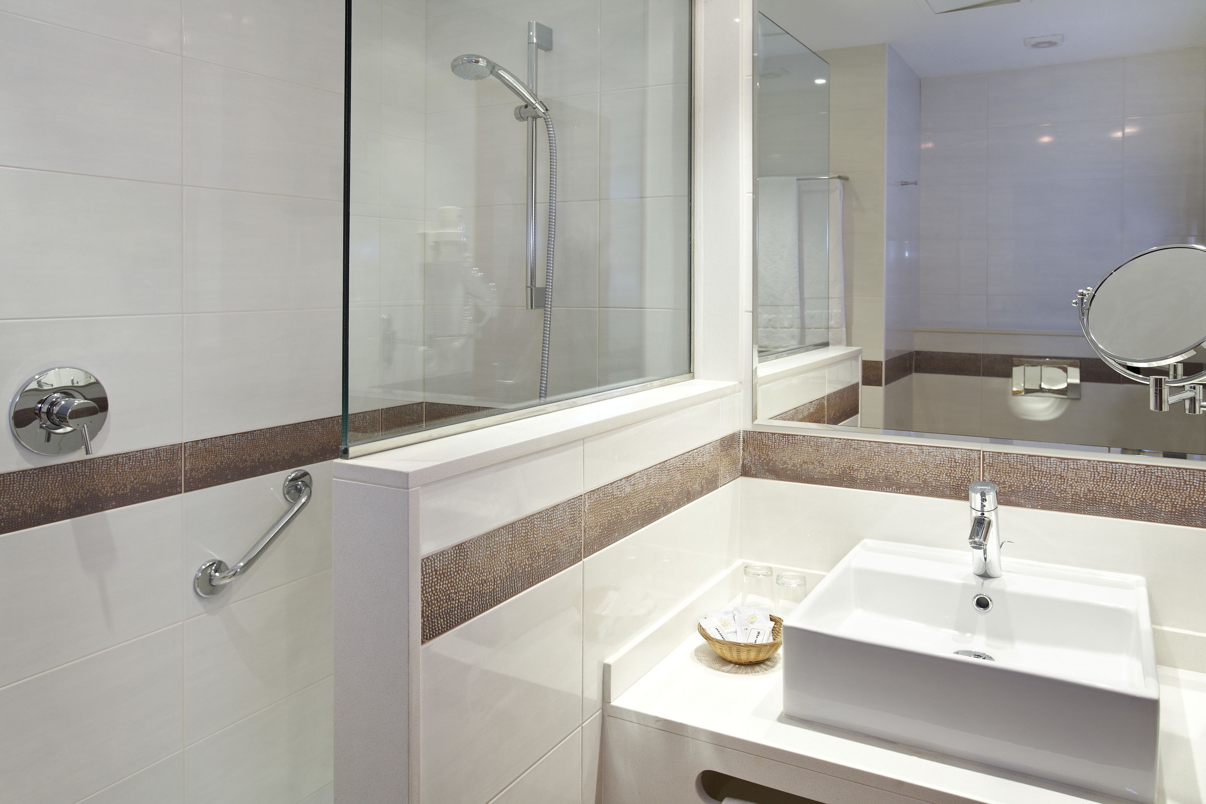 eco-friendly toiletries, hair dryer, towels