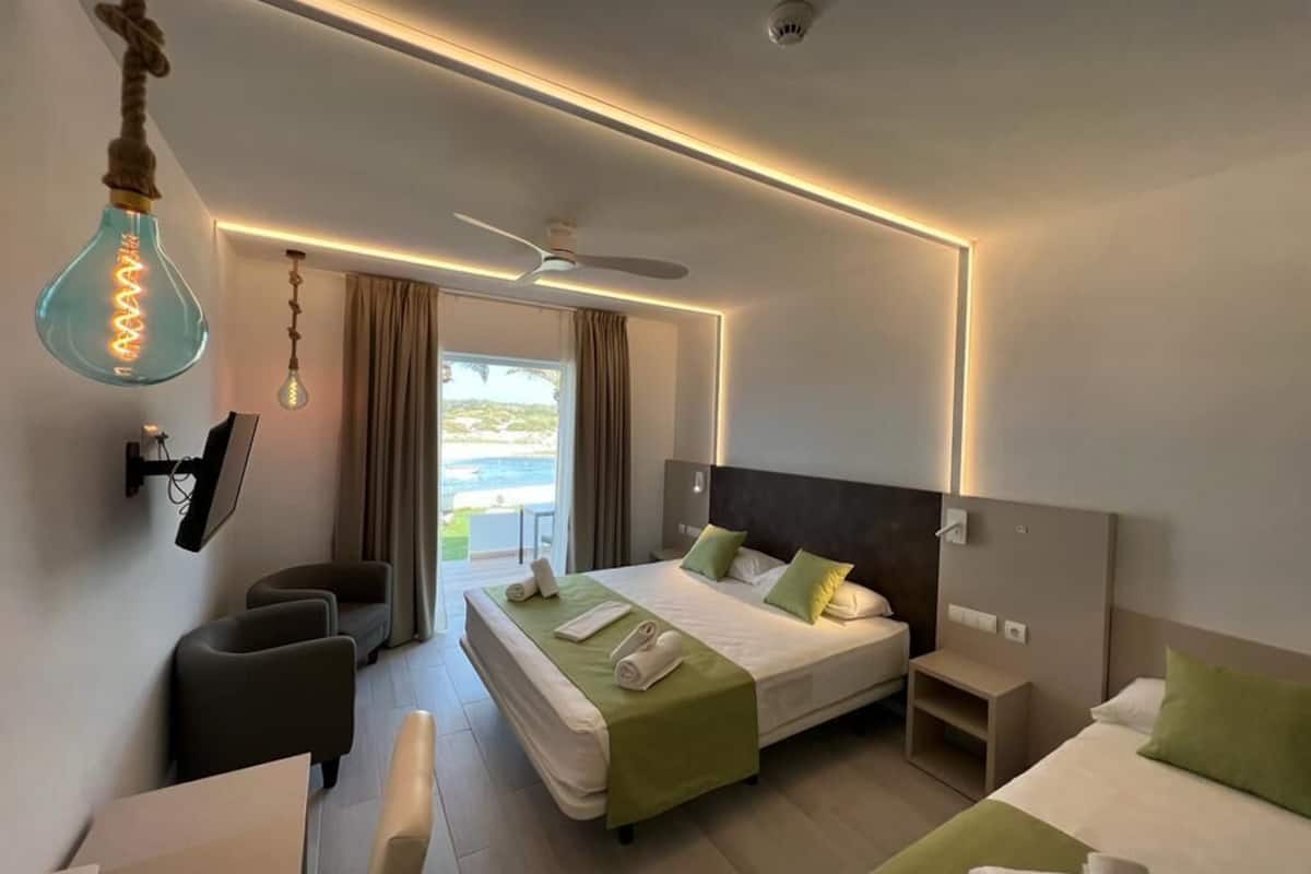 premium room, balcony, partial ocean view | 1 bedroom, desk, blackout curtains, cots/infant beds