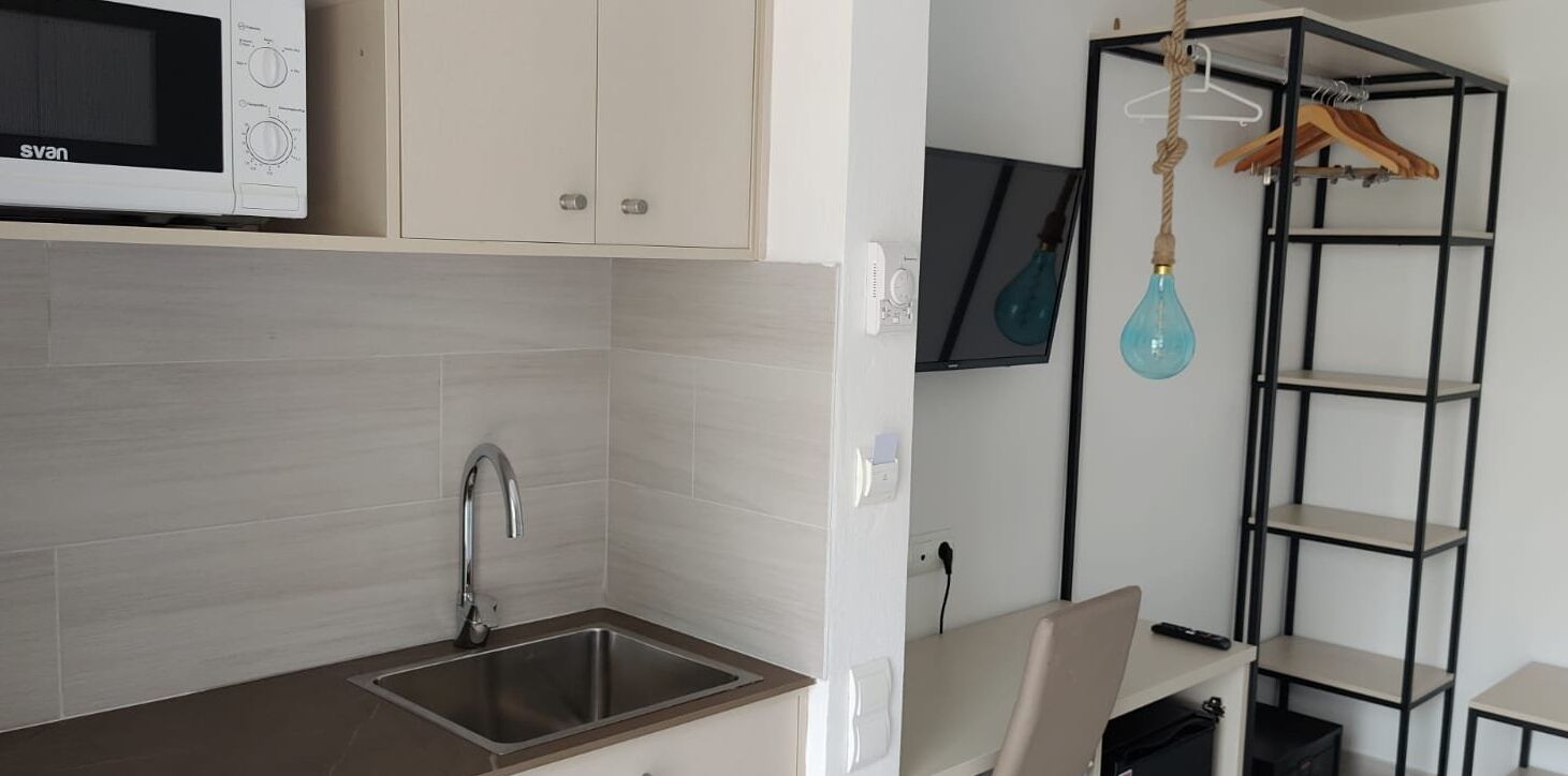 premium room, balcony, partial ocean view | private kitchenette | mini-fridge