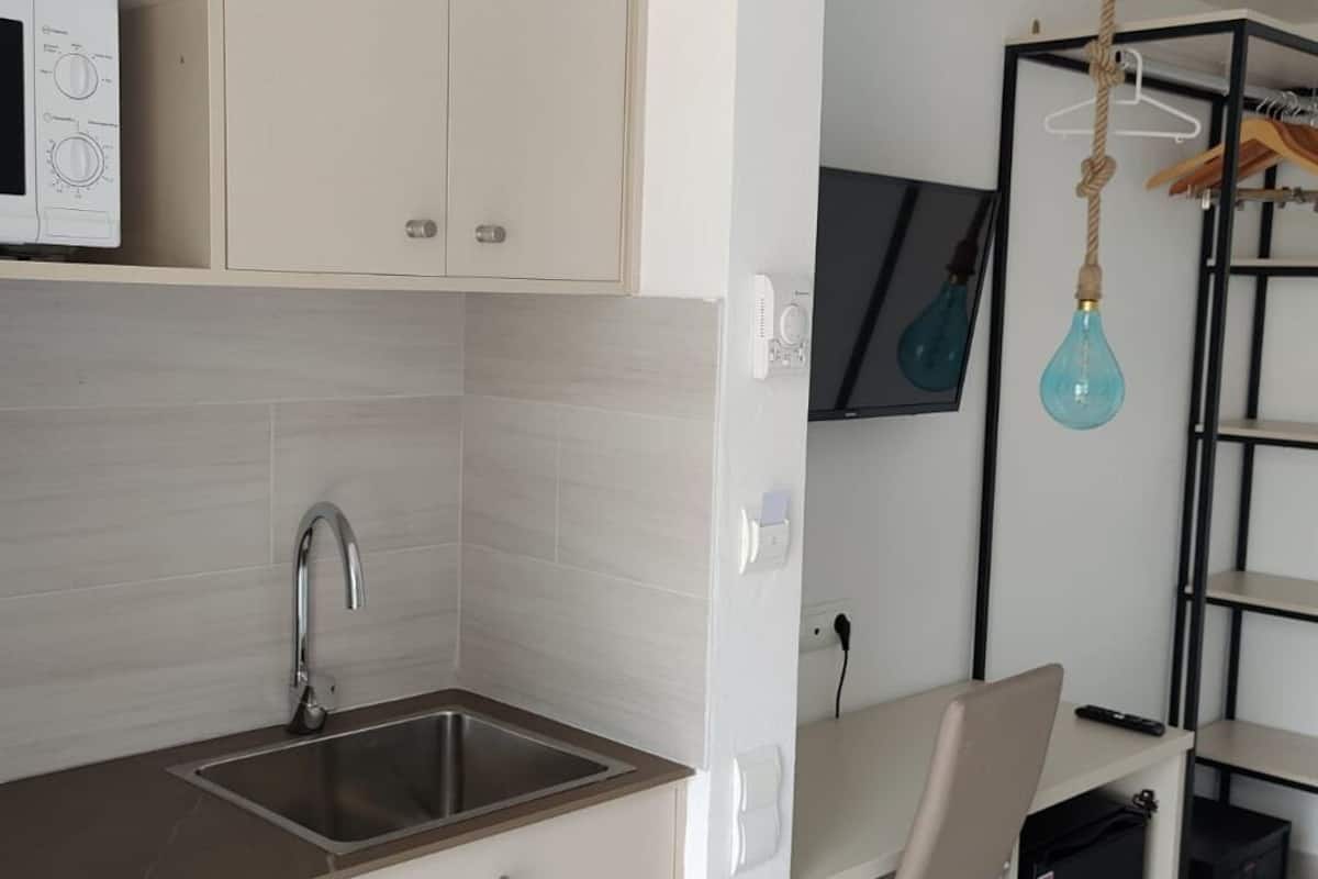 premium room, balcony, partial ocean view | private kitchenette | mini-fridge