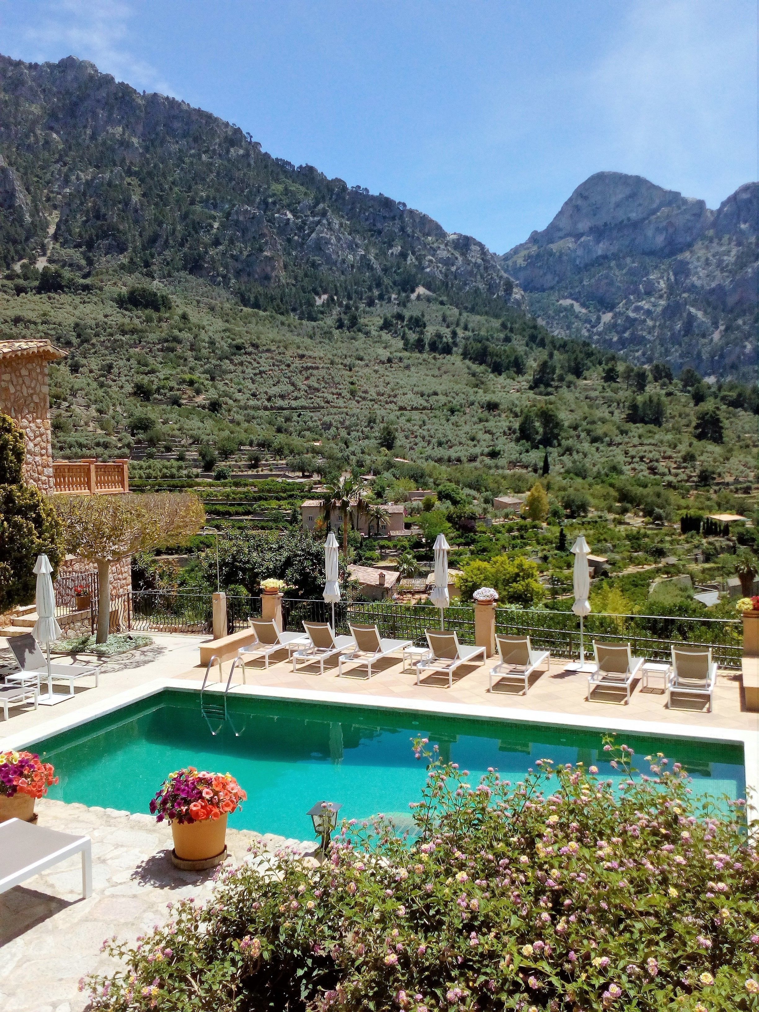 Outdoor pool, open 9:00 AM to 9:00 PM, pool umbrellas, pool loungers