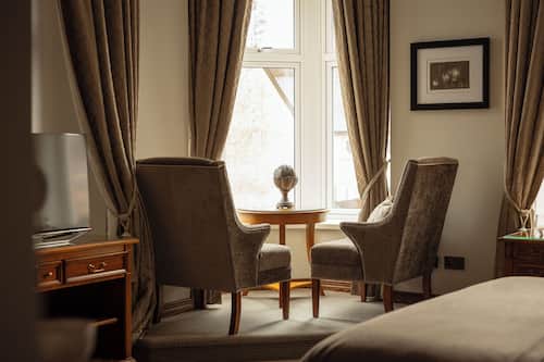 Junior Suite | Living area | Flat-screen TV