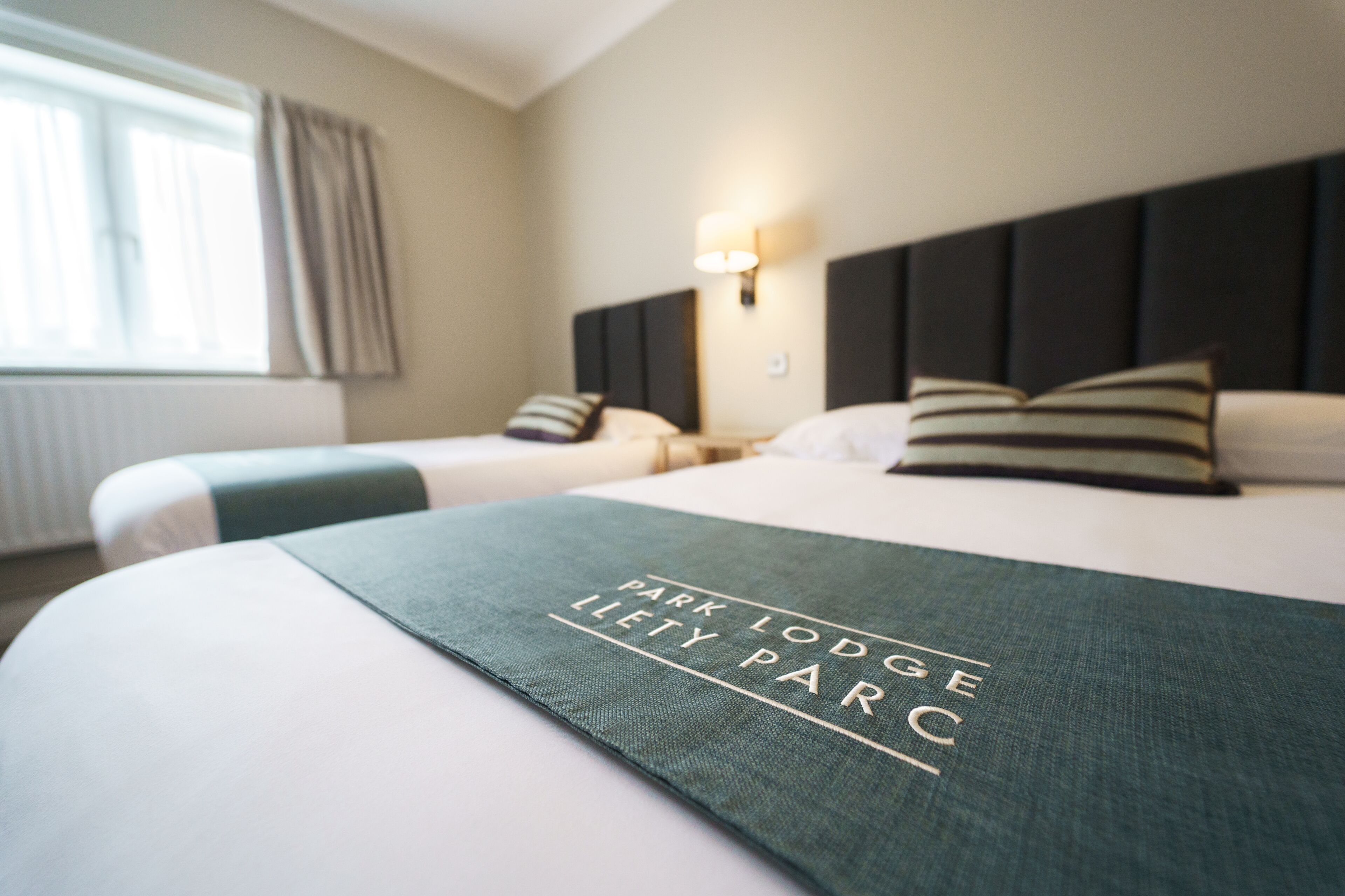 Family Triple Room, Multiple Beds | Desk, laptop workspace, iron/ironing board, free WiFi