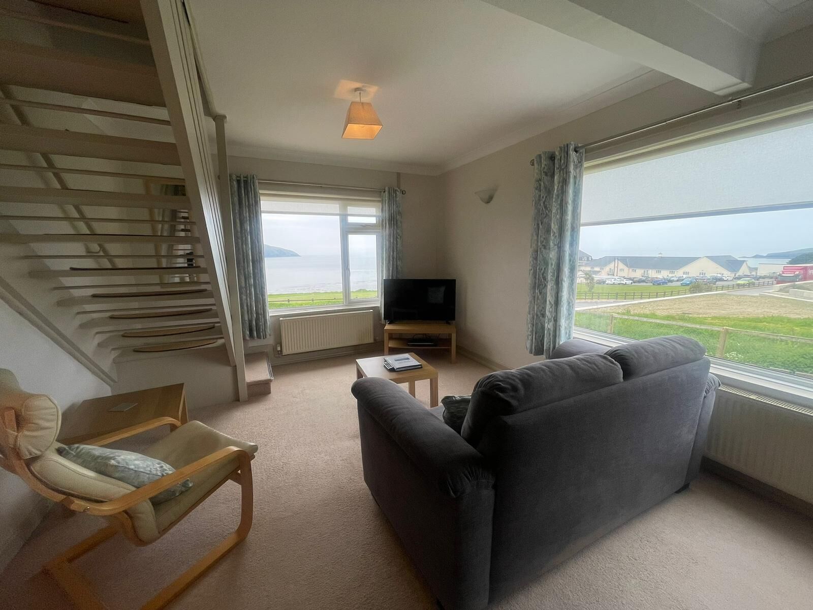 house, 1 double bed, partial sea view | living area | 40-inch flat-screen tv with digital channels, tv