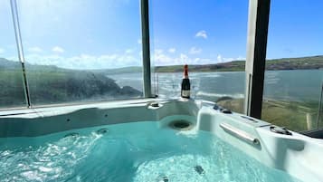Lyxig studiosvit - 1 kingsize-säng - bubbelpool - havsutsikt | Terrass/Patio
