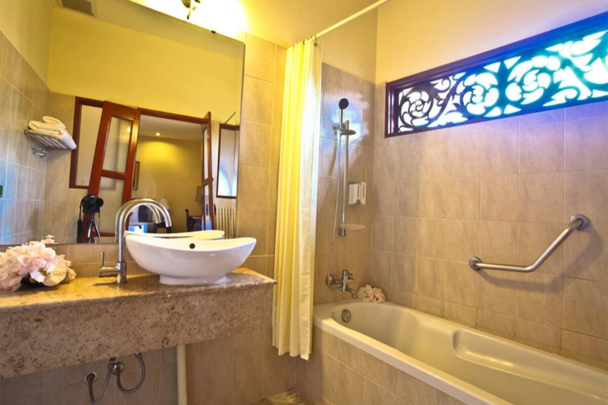 superior room | bathroom | shower, free toiletries, hair dryer, bathrobes