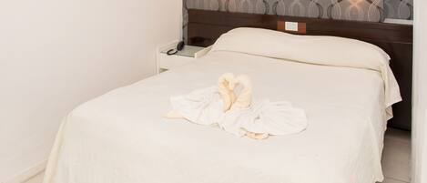 Premium bedding, in-room safe, individually decorated