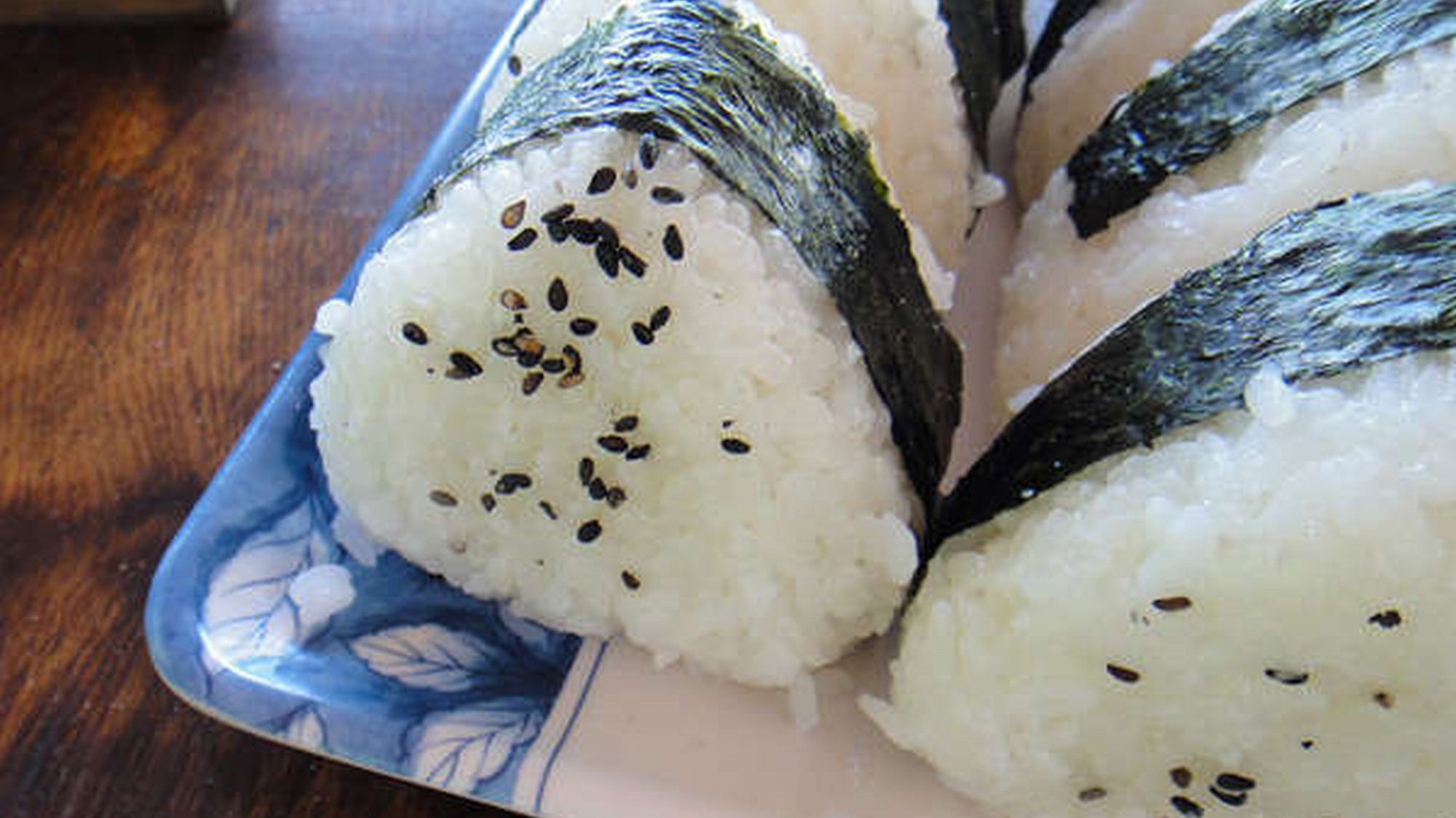 Sushi rolls with seaweed on a plate.