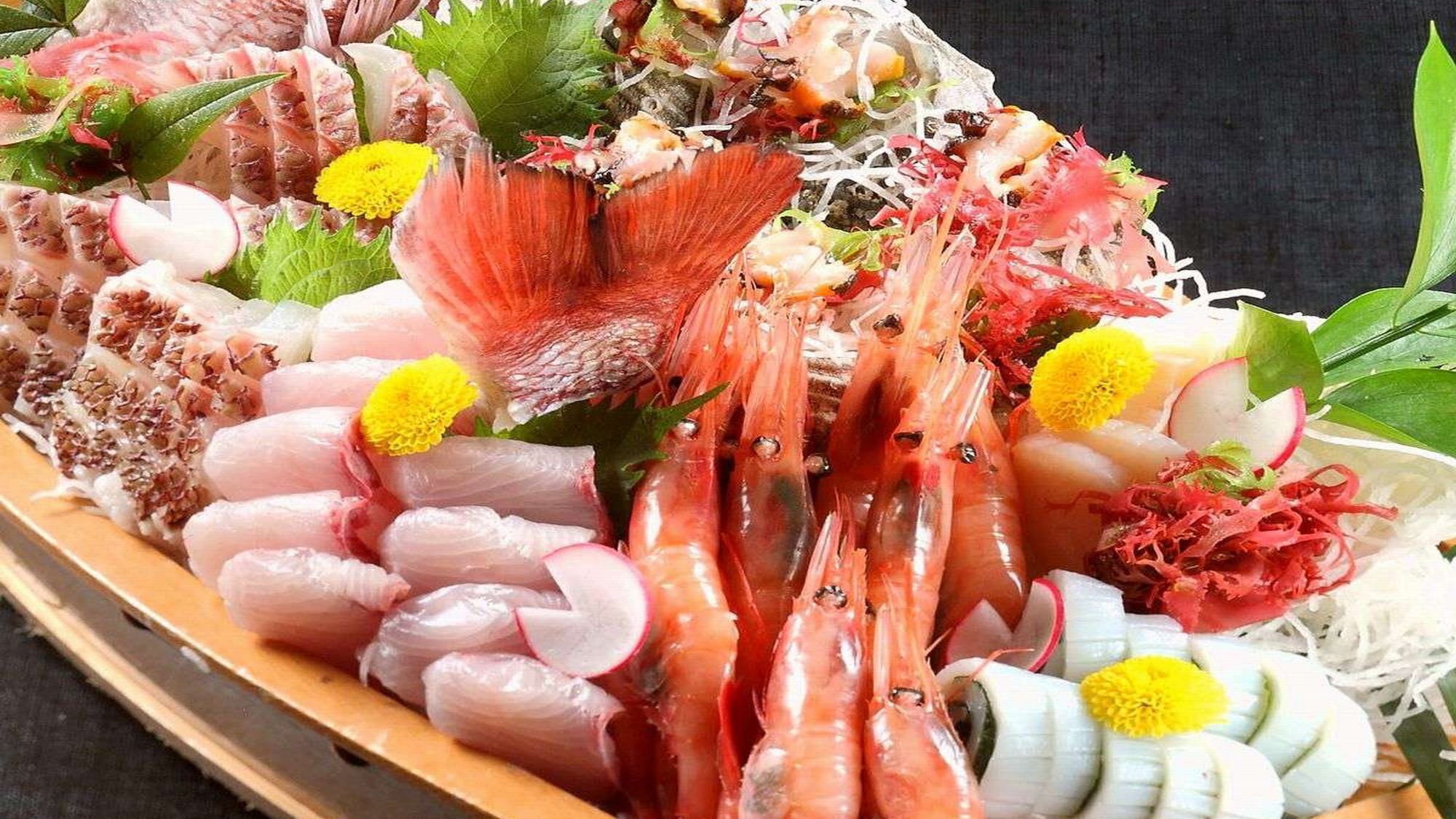 A variety of seafood arranged on a wooden tray.