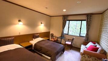 Twin Room, Non Smoking | 1 bedroom, down comforters, desk, laptop workspace