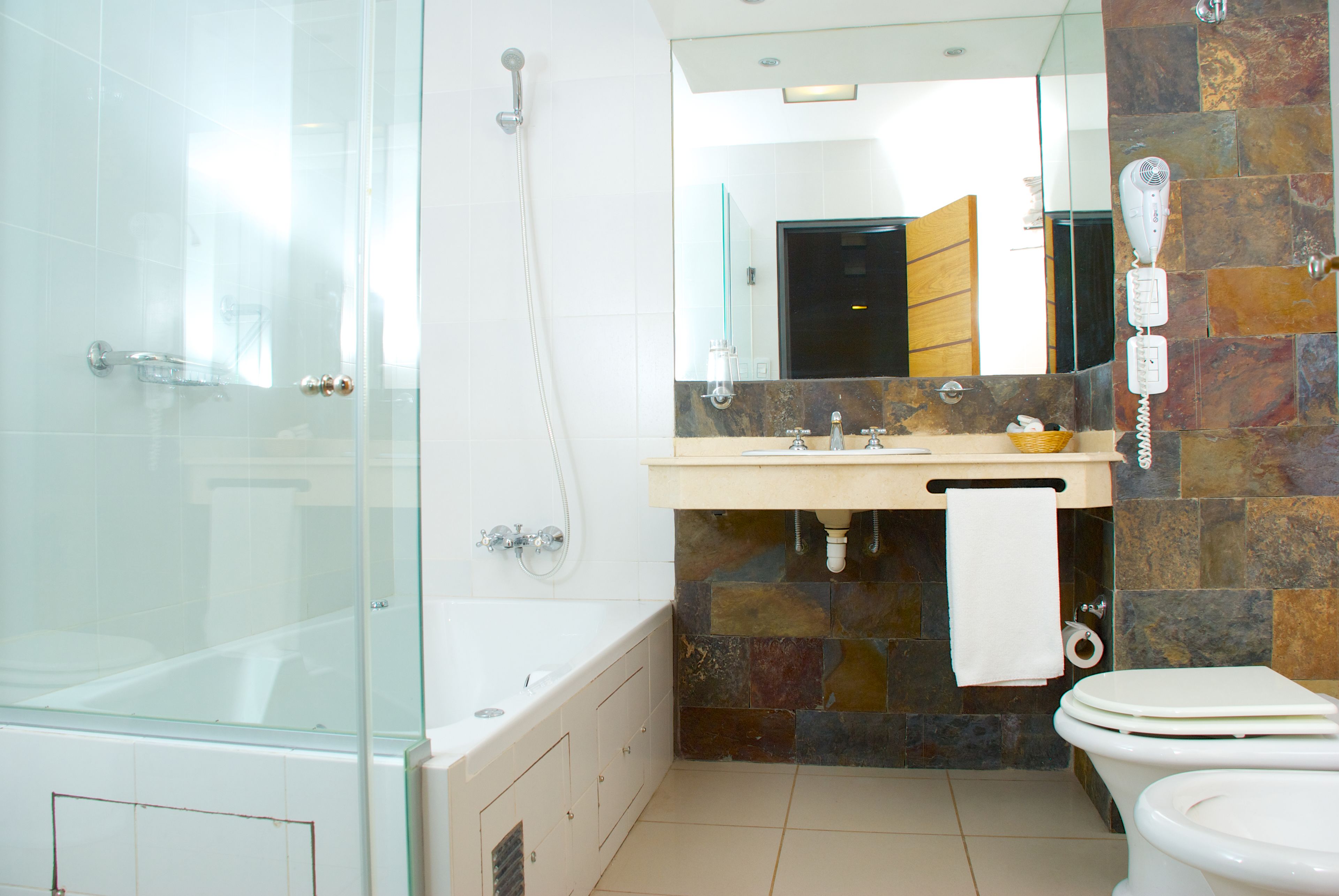 Free toiletries, hair dryer, bidet, towels