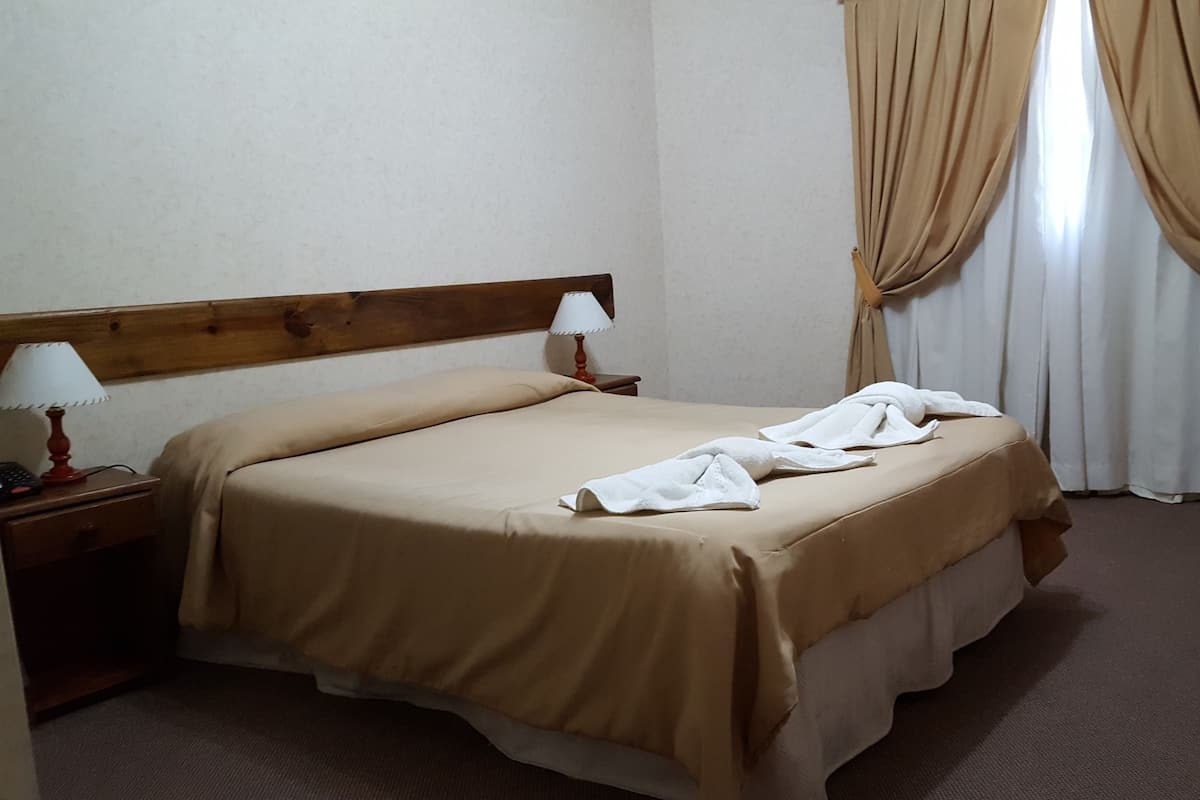 Economy Double Room, 1 Double Bed | In-room safe, blackout drapes, free WiFi, bed sheets