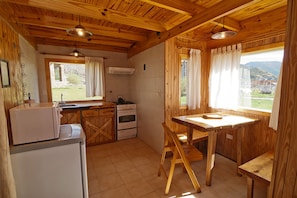 Family Bungalow, 1 Bedroom | Private kitchen | Highchair
