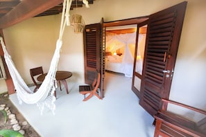 Quadruple Room | Minibar, in-room safe, individually decorated, blackout drapes