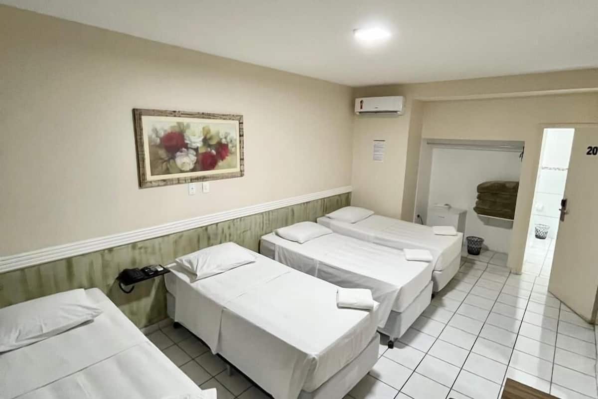 Executive Quadruple Room, 1 Bedroom | 1 bedroom, minibar, desk, free WiFi