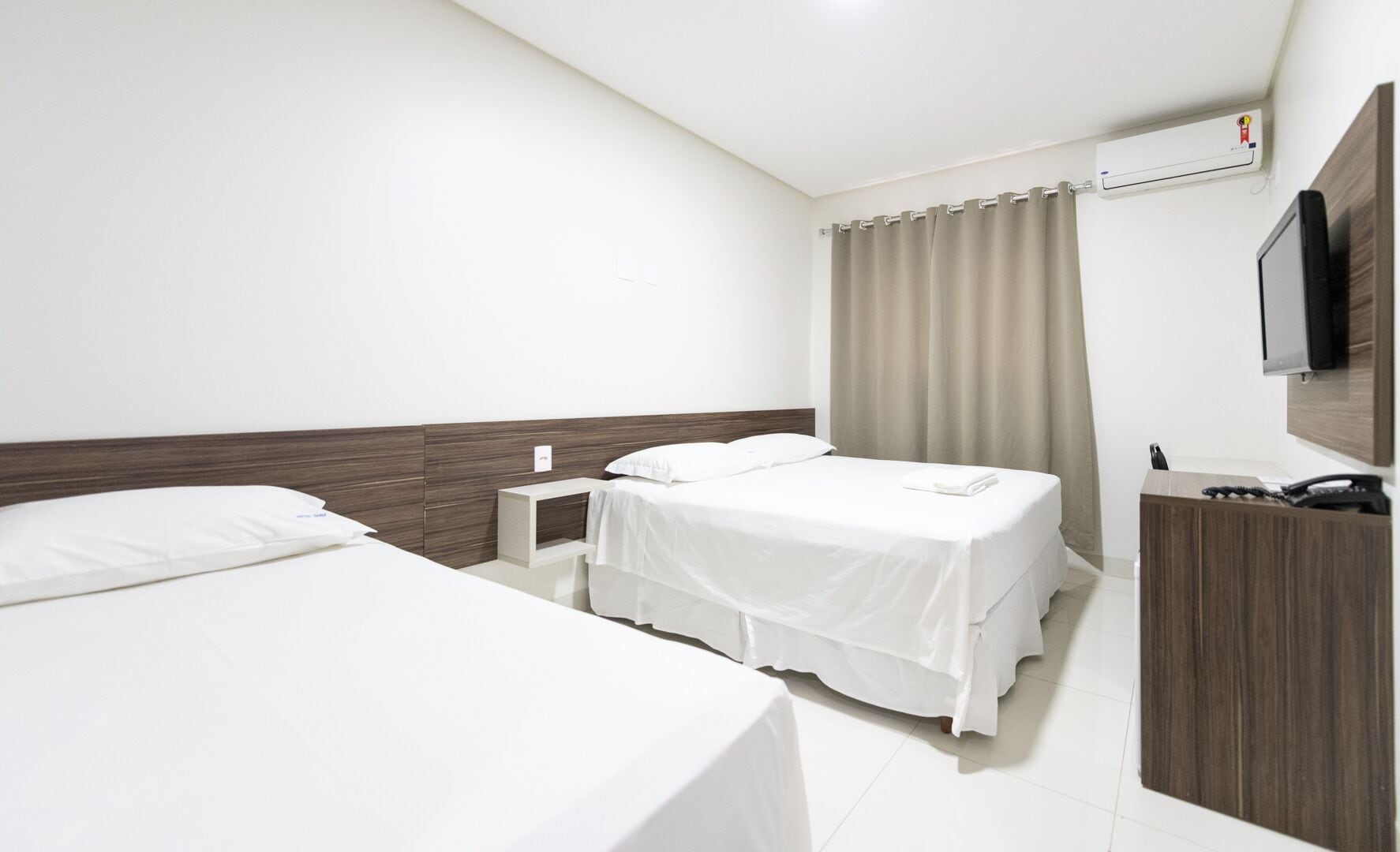 triple room | minibar, in-room safe, desk, blackout curtains