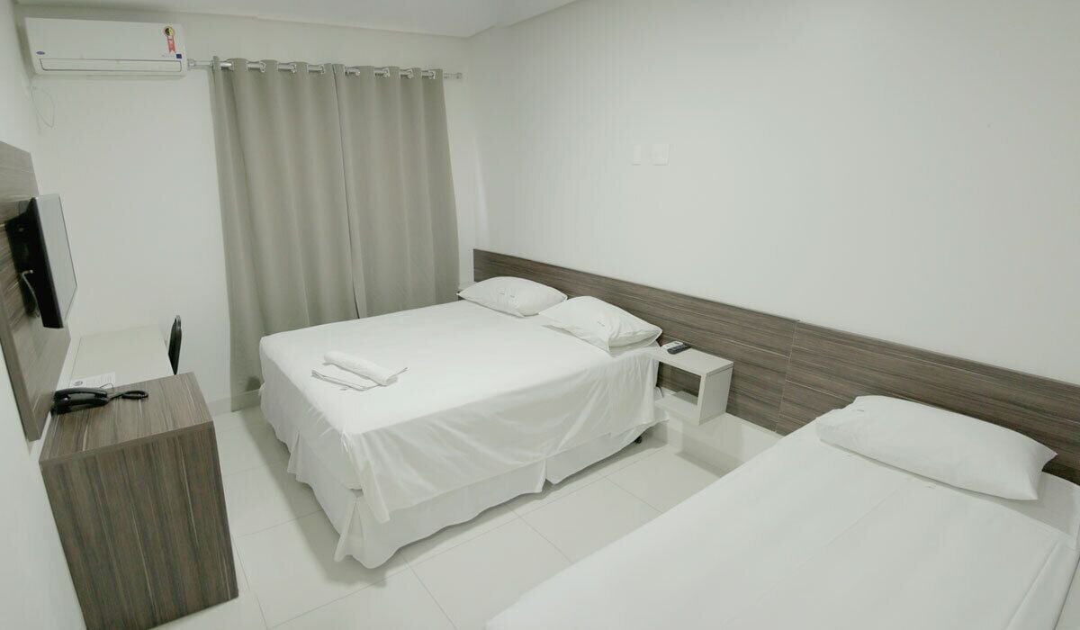 deluxe twin room | minibar, in-room safe, desk, blackout curtains