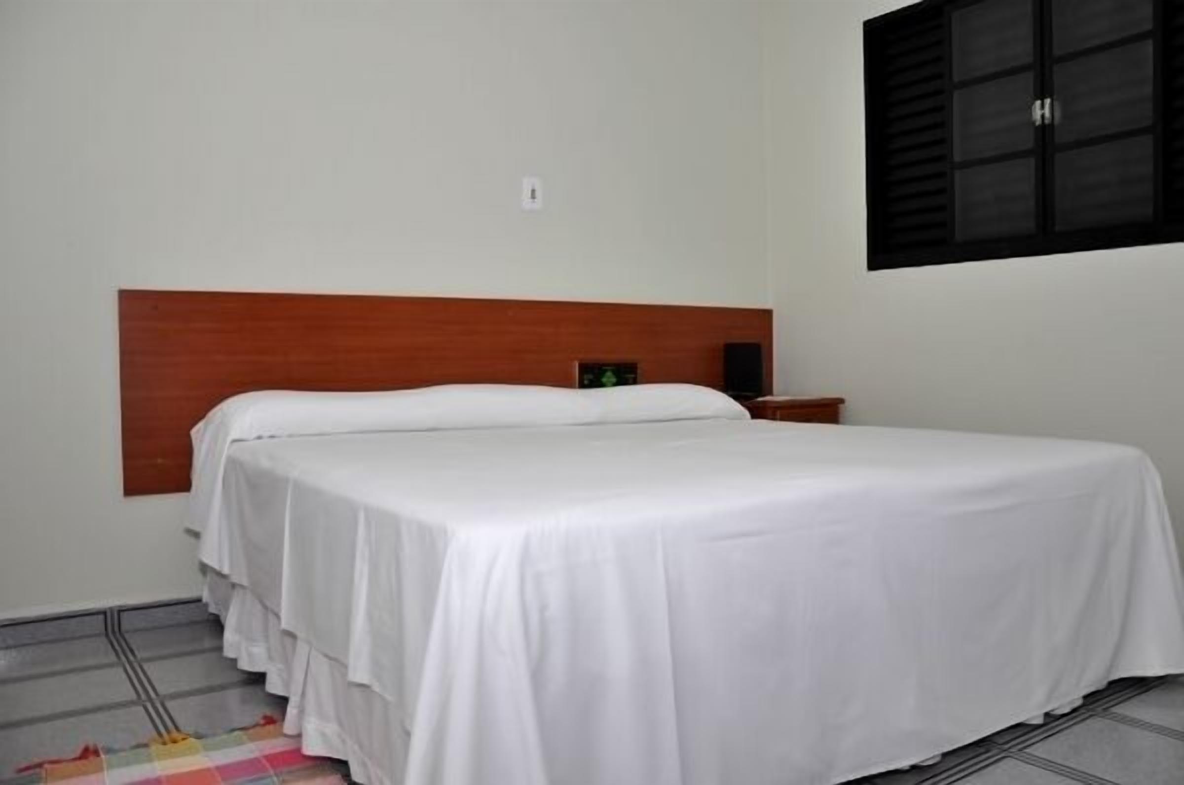 standard twin room | minibar, desk, blackout curtains, iron/ironing board