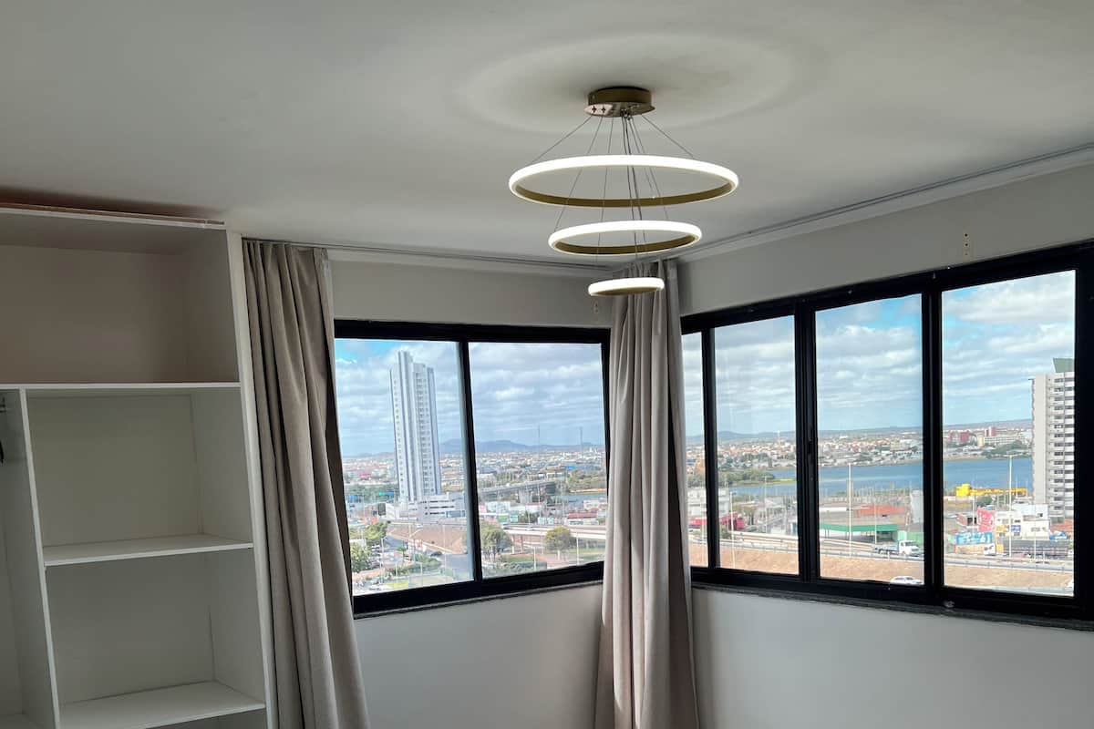 Deluxe Room | Individually decorated, desk, blackout drapes, iron/ironing board