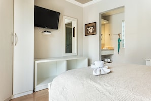 Suite Deluxe | Literie de qualité supérieure, minibar, décoration personnalisée