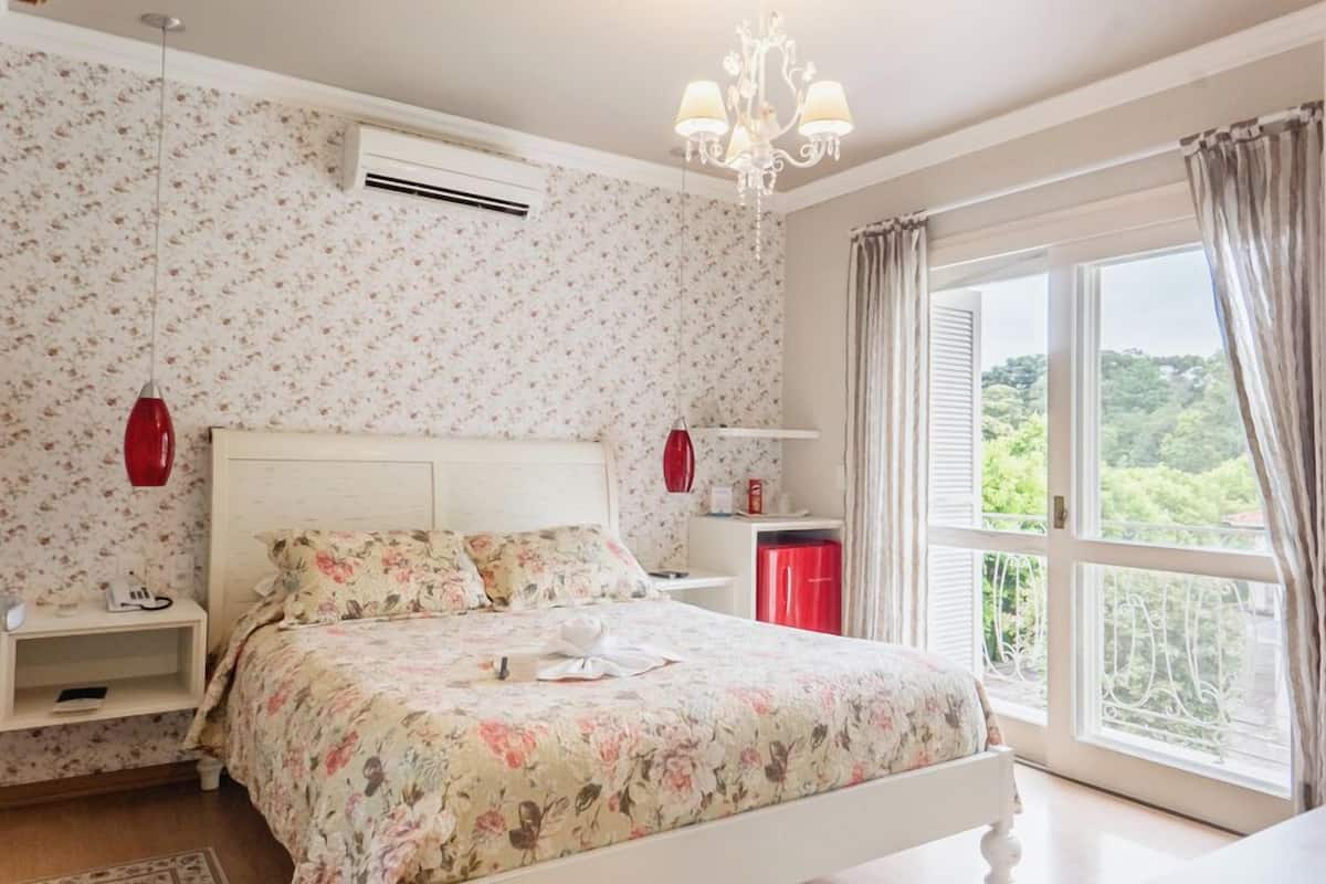 Suite Luxo Superior | Biancheria da letto di alta qualità, minibar, con stile personalizzato