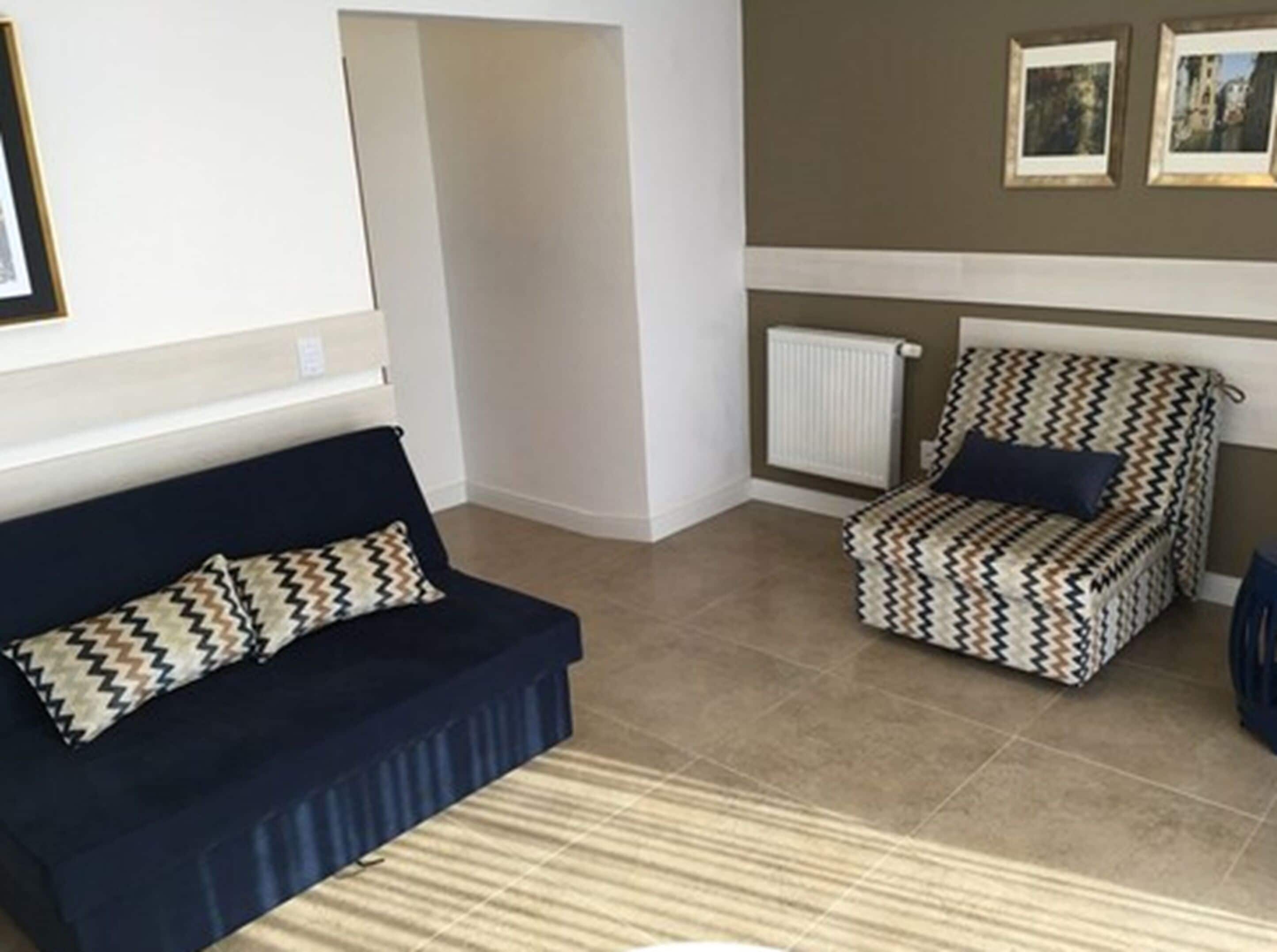 suite | living room | 32-inch led tv with satellite channels, tv