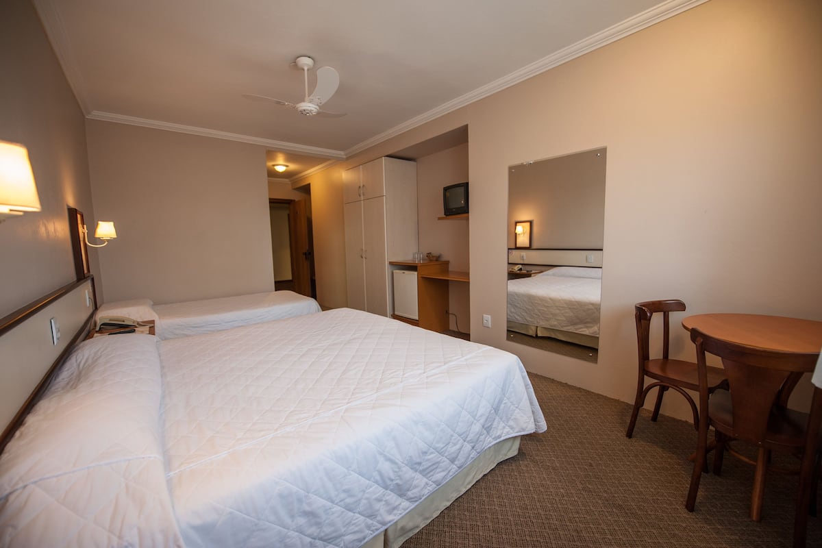 Deluxe Triple Room | 1 bedroom, hypo-allergenic bedding, minibar, blackout drapes