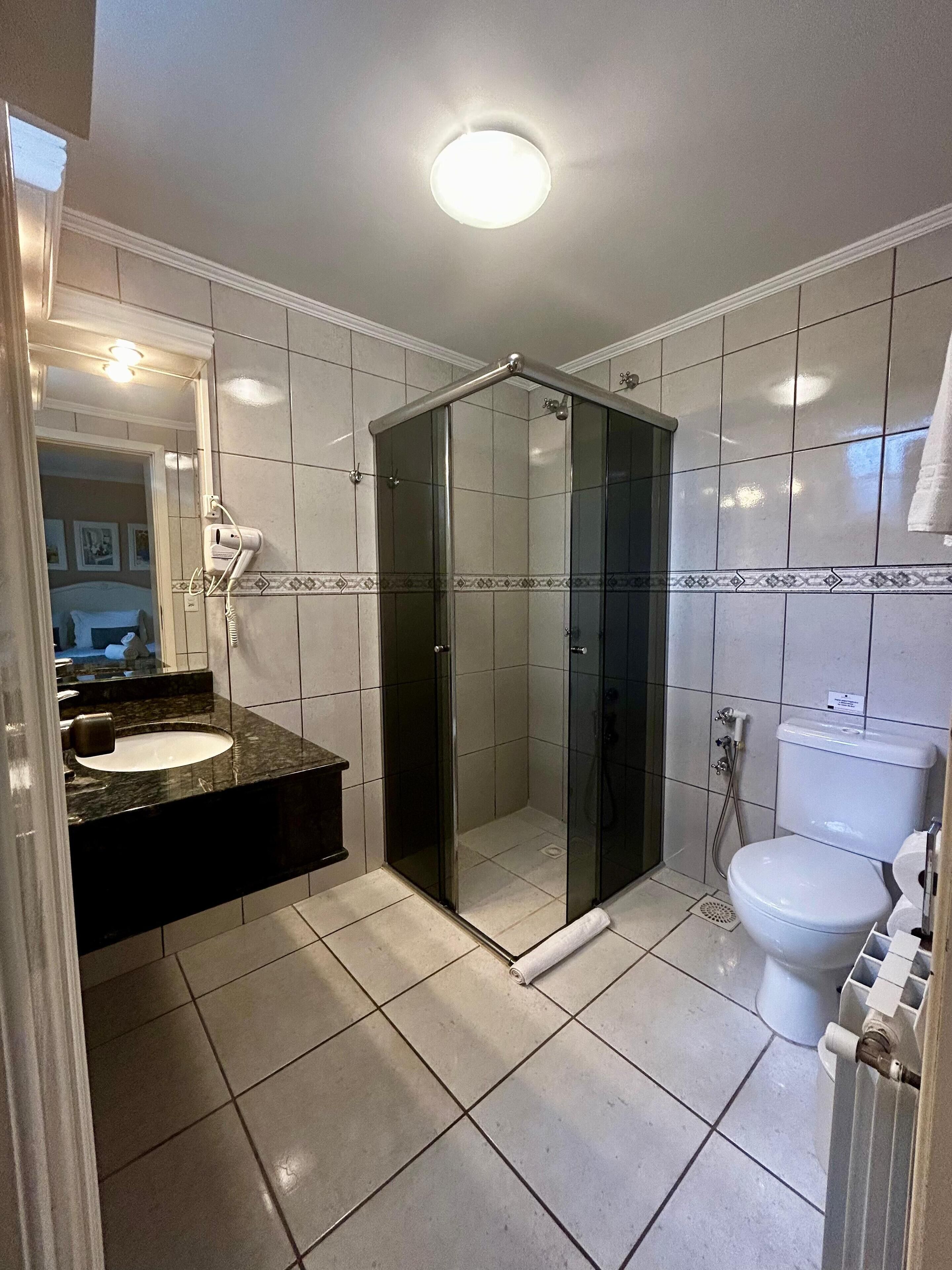 economy double or twin room | bathroom | shower, free toiletries, hair dryer, bidet