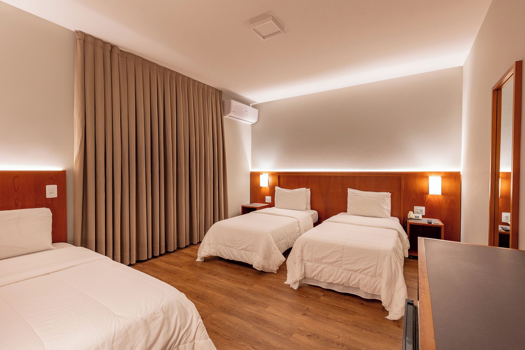 deluxe triple room | 1 bedroom, minibar, desk, blackout curtains