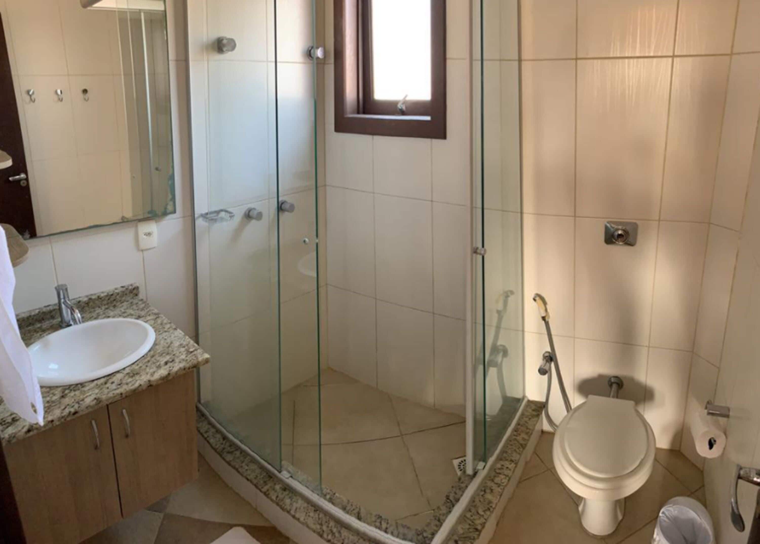 standard room | bathroom | shower, free toiletries, hair dryer, towels
