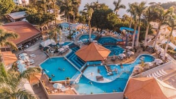 Indoor pool, pool umbrellas, pool loungers