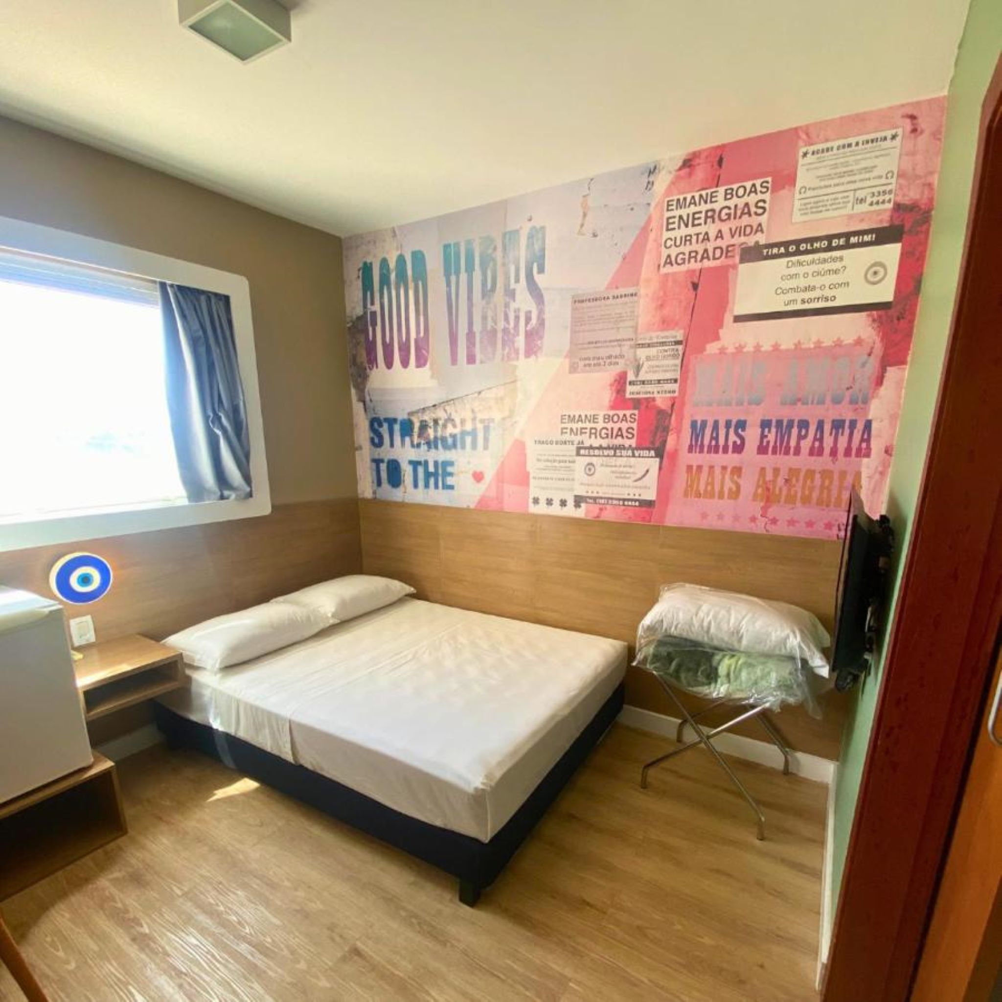 Minibar, desk, blackout curtains, iron/ironing board