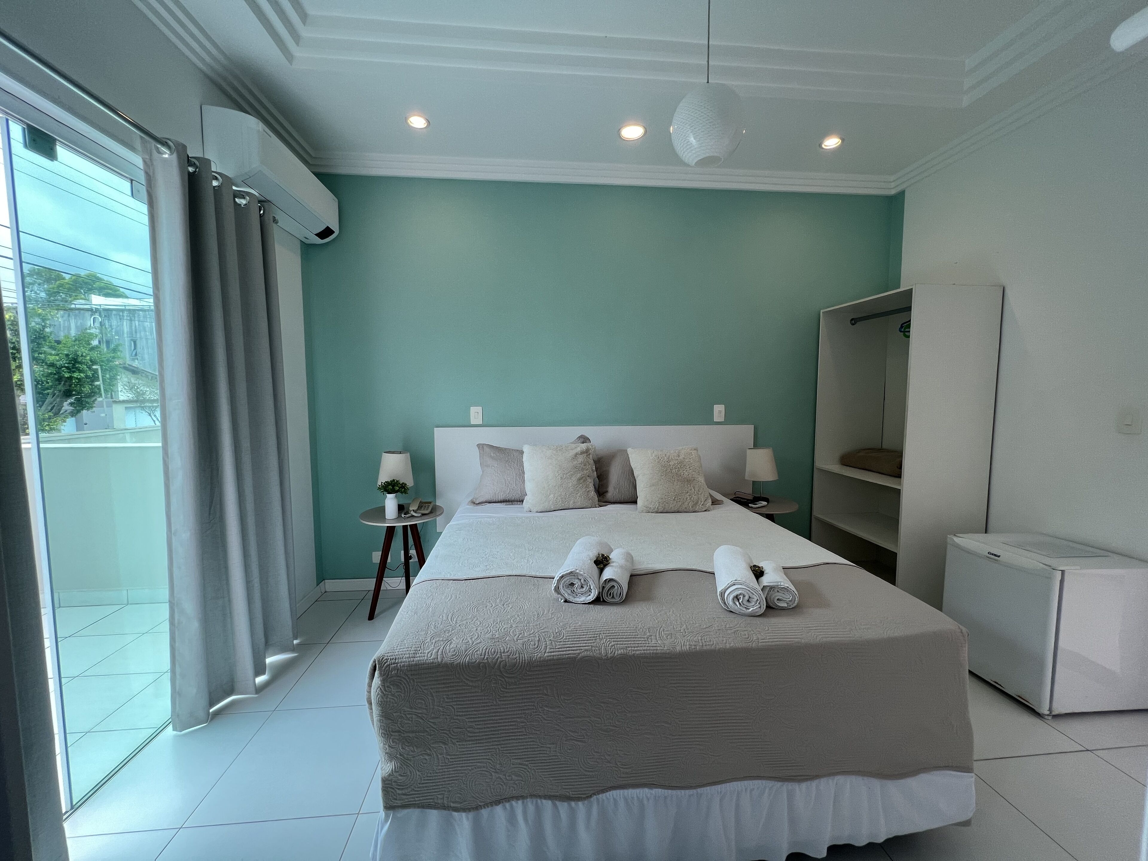 Deluxe Double Room | Minibar, individually decorated, individually furnished, blackout drapes