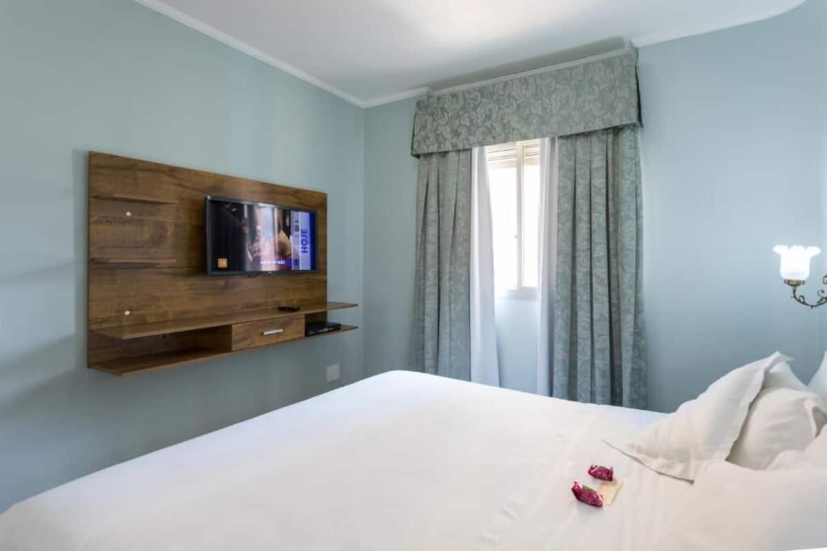 Dubleks, Şehir Manzaralı | 1 yatak odası, minibar, odada kasa, güneşlik/perde