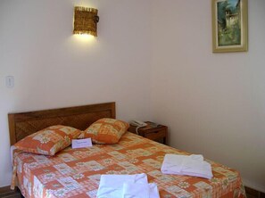 Minibar, blackout curtains, bed sheets