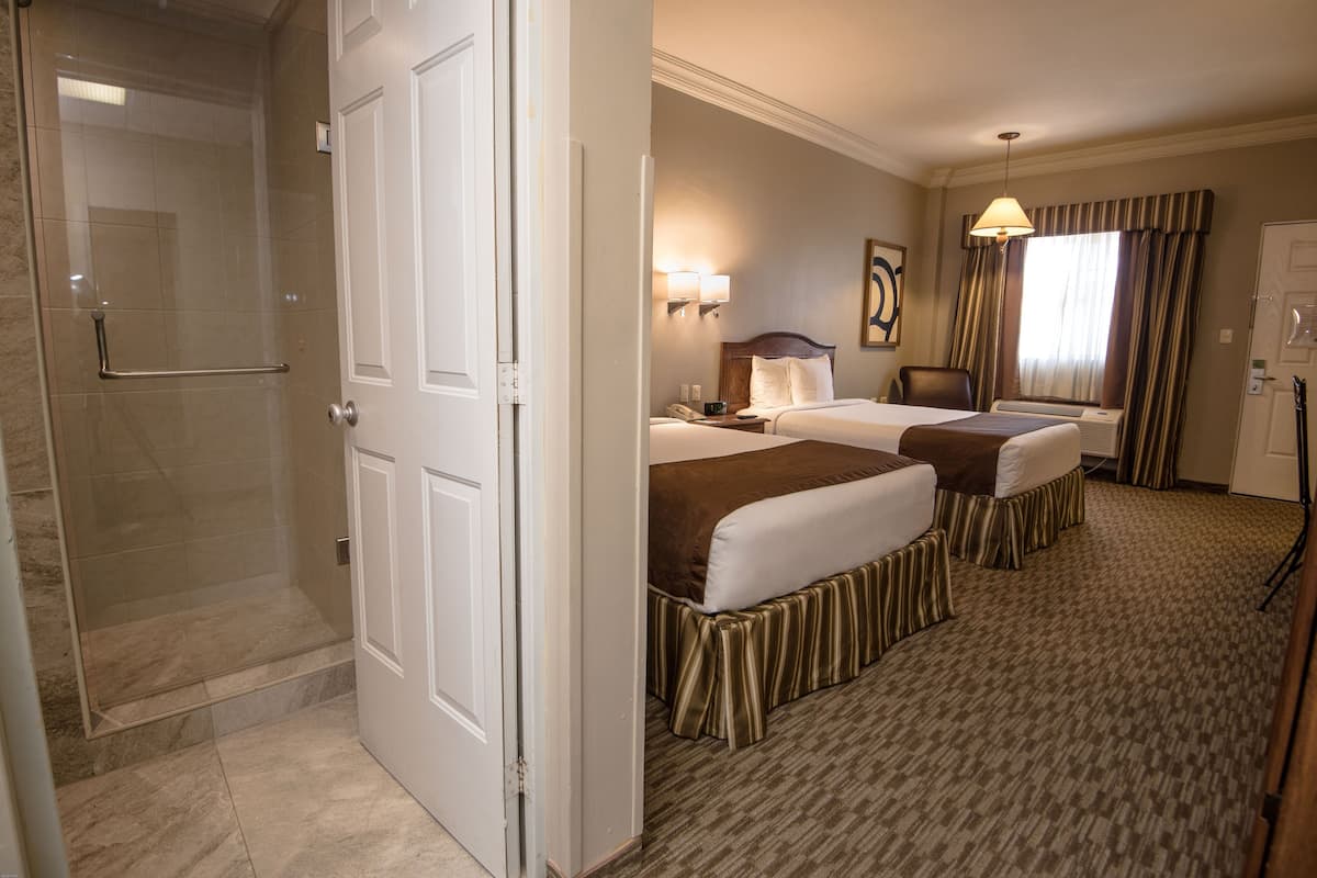 double room, 2 double beds | bathroom | shower, free toiletries, hair dryer, towels