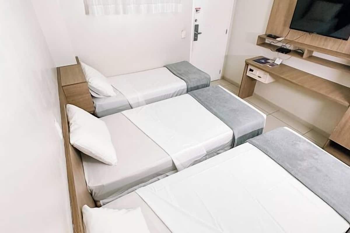 standard triple room | in-room safe, desk, blackout curtains, free wifi