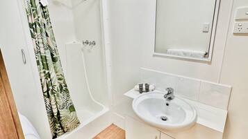 One Bedroom Cabin | Bathroom | Free toiletries, hair dryer, towels, toilet paper