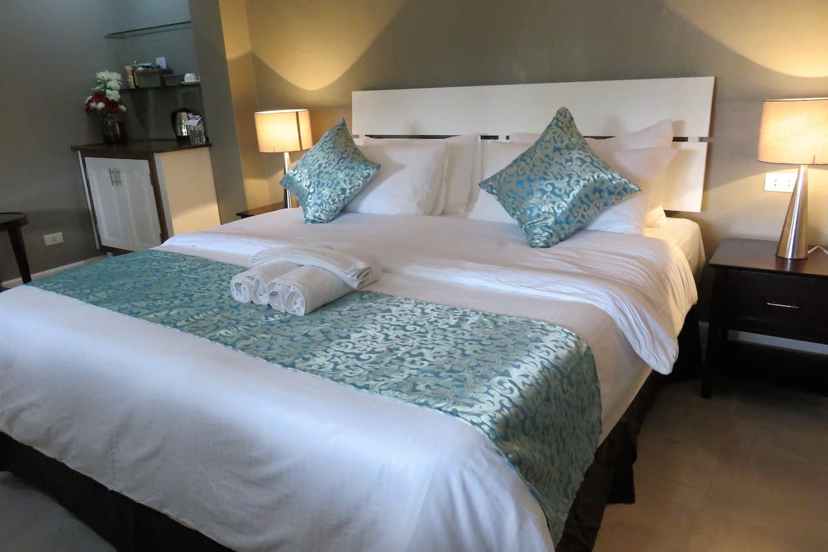 deluxe double room, resort view | desk, laptop workspace, free wifi, bed sheets