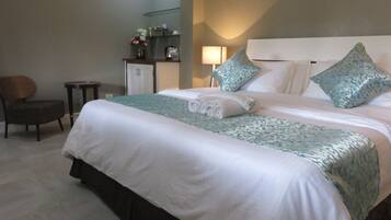 Deluxe Double Room, Resort View | Desk, laptop workspace, free WiFi, bed sheets