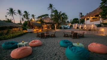 On the beach, sun loungers, snorkeling, kayaking