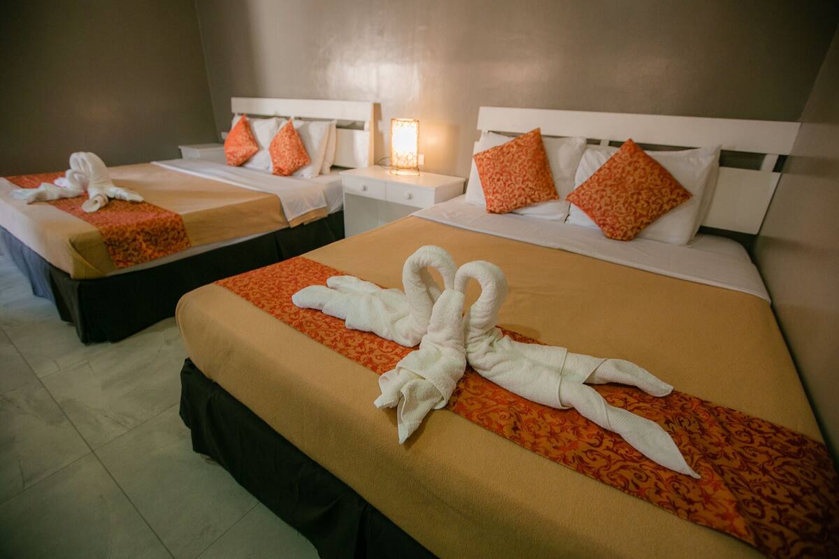 family room, 1 bedroom, garden view | desk, laptop workspace, free wifi, bed sheets