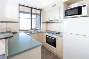 Premium Lakeview Apartment | Private kitchen | Fridge, coffee/tea maker - The Brighton Apartments (Toronto)