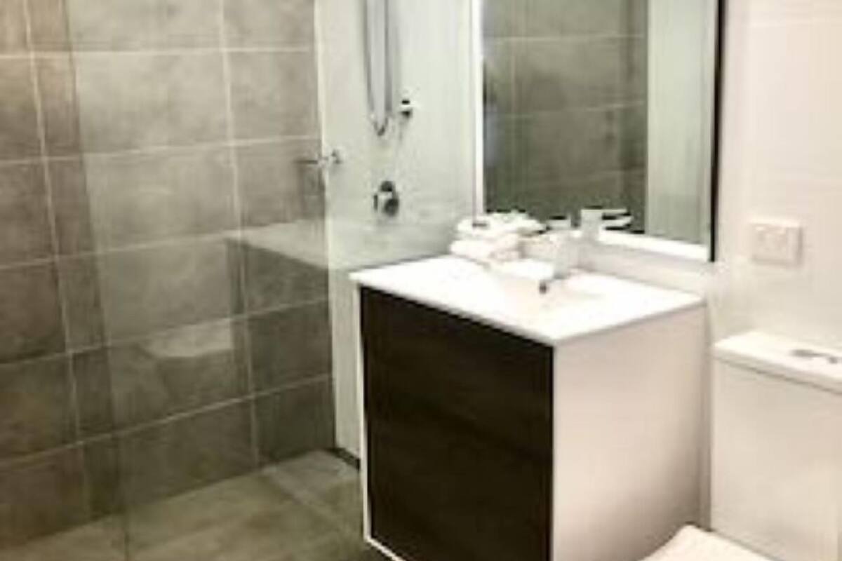 two bedroom apartment | bathroom | shower, free toiletries, hair dryer, towels