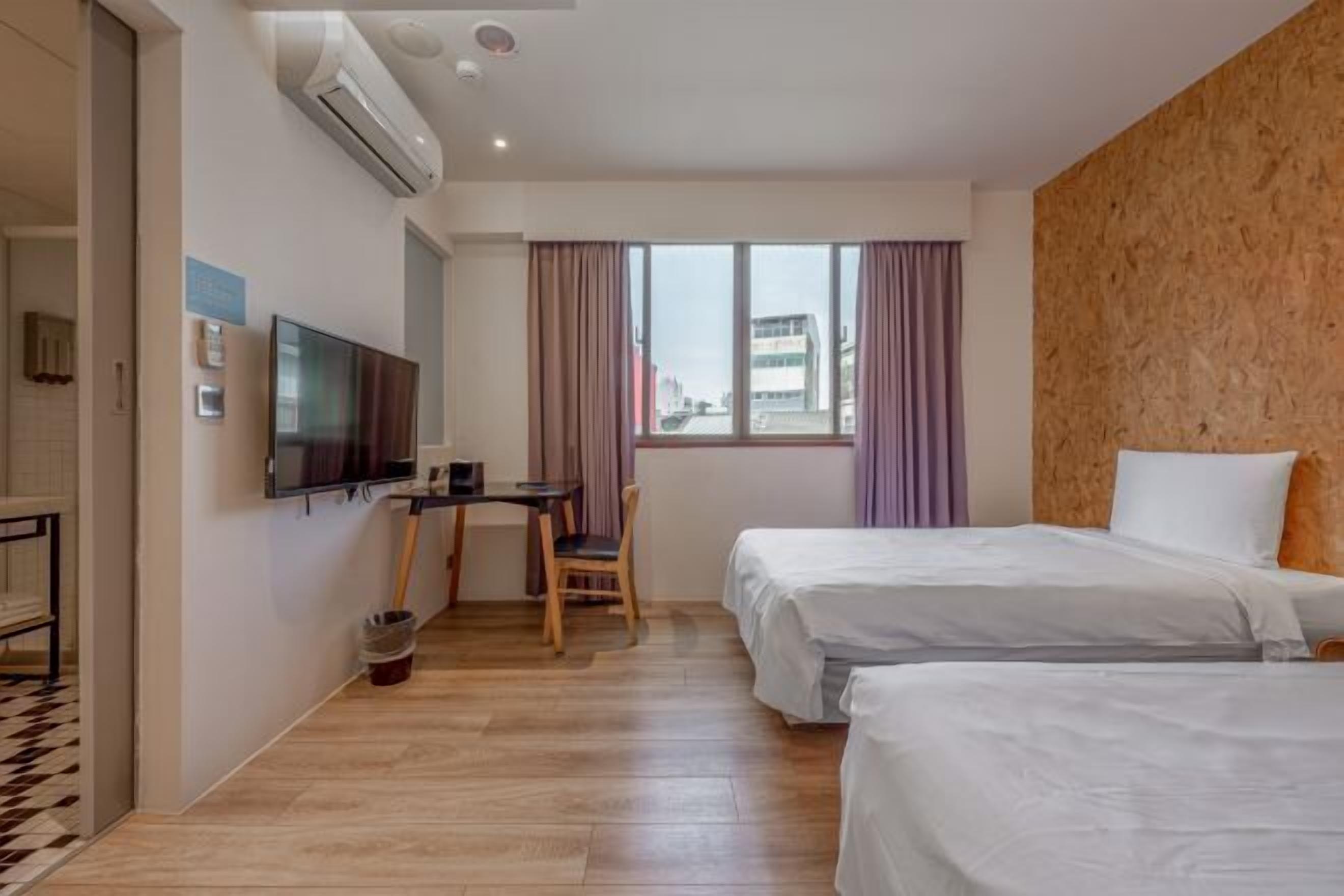 Down comforters, blackout drapes, iron/ironing board, free WiFi