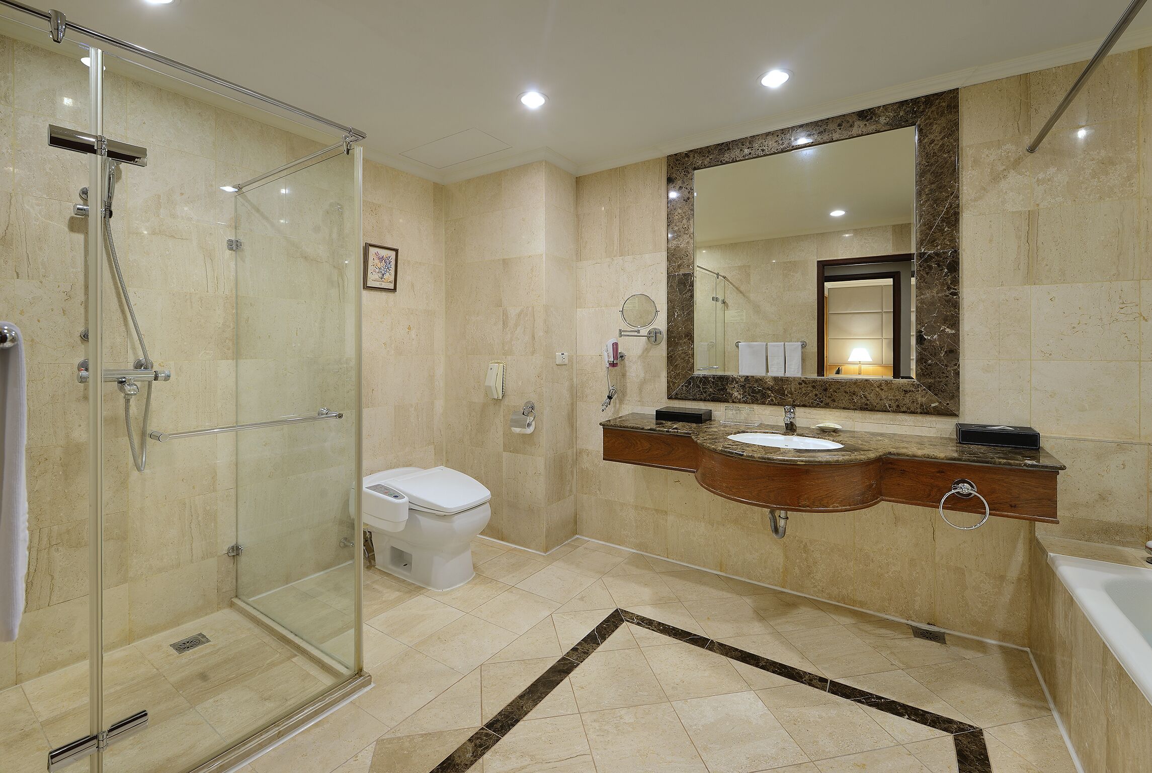 deluxe suite | bathroom | separate bathtub and shower, hair dryer, bathrobes, slippers