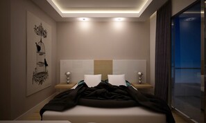 A modern bedroom with a bed, two bedside tables, a nightstand, a wall-mounted artwork, and a view through a glass door. - Amore Hotel (Kemer)