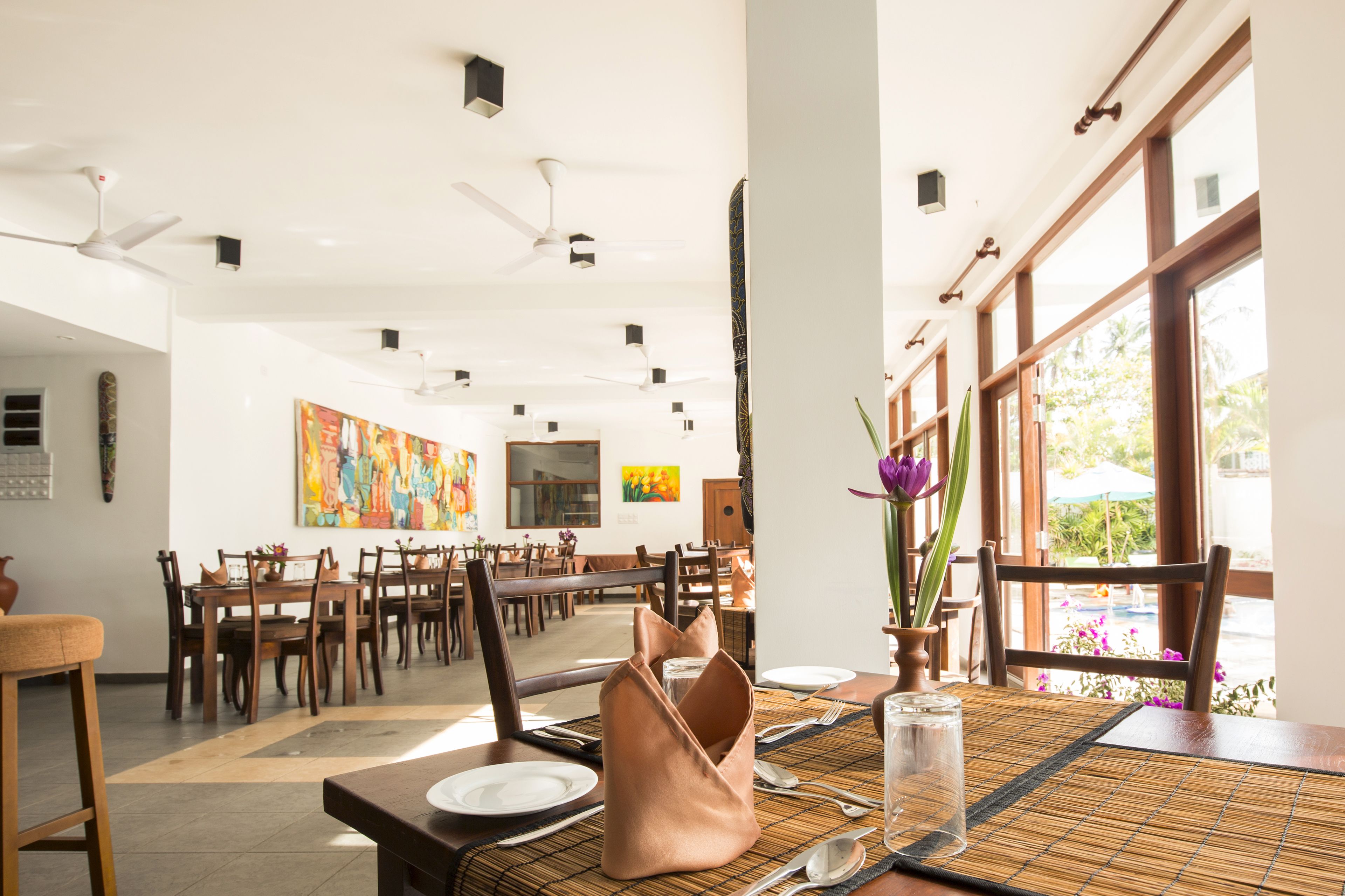 Breakfast, lunch, dinner served; international cuisine, pool views 