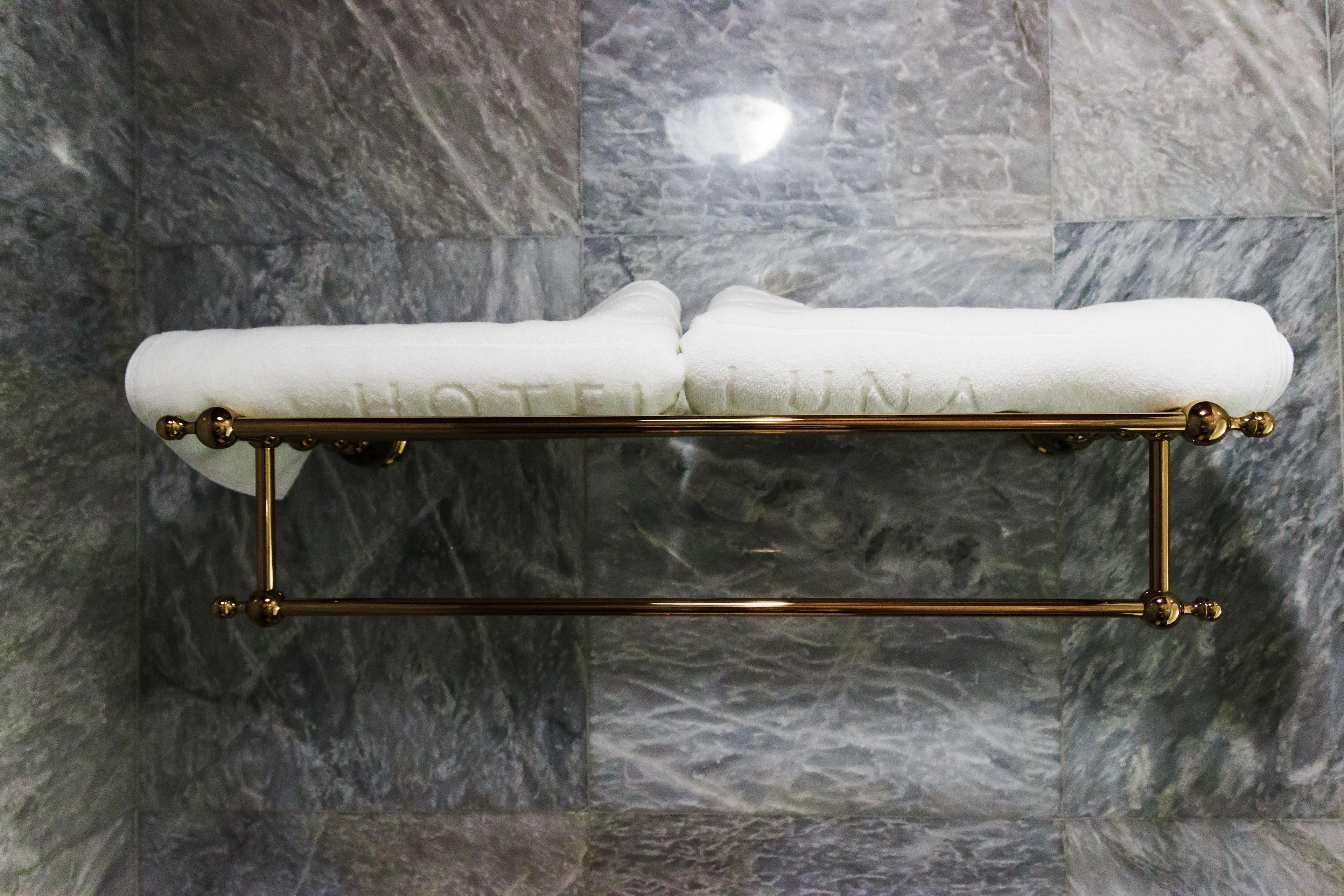 shower, free toiletries, slippers, towels